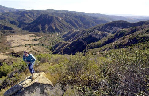 A hiker explores rugged Fremont Canyon in Orange County's Irvine Ranch.